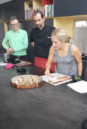 Kate Gibbs, Miccal Cummins and Cyril Miletto shooting the canapes